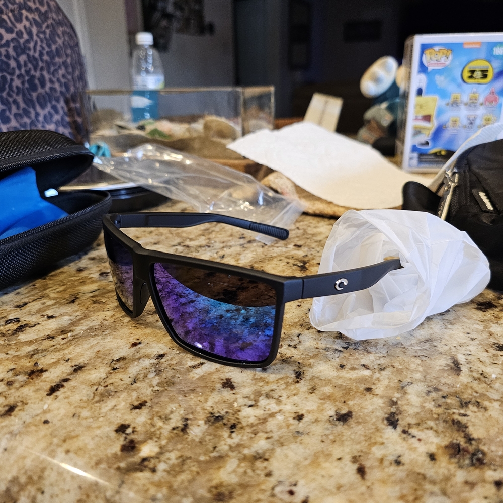 Costa Black Sunglasses with Blue Lenses
